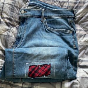 Eddie Bauer jeans with buffalo red flannel patch